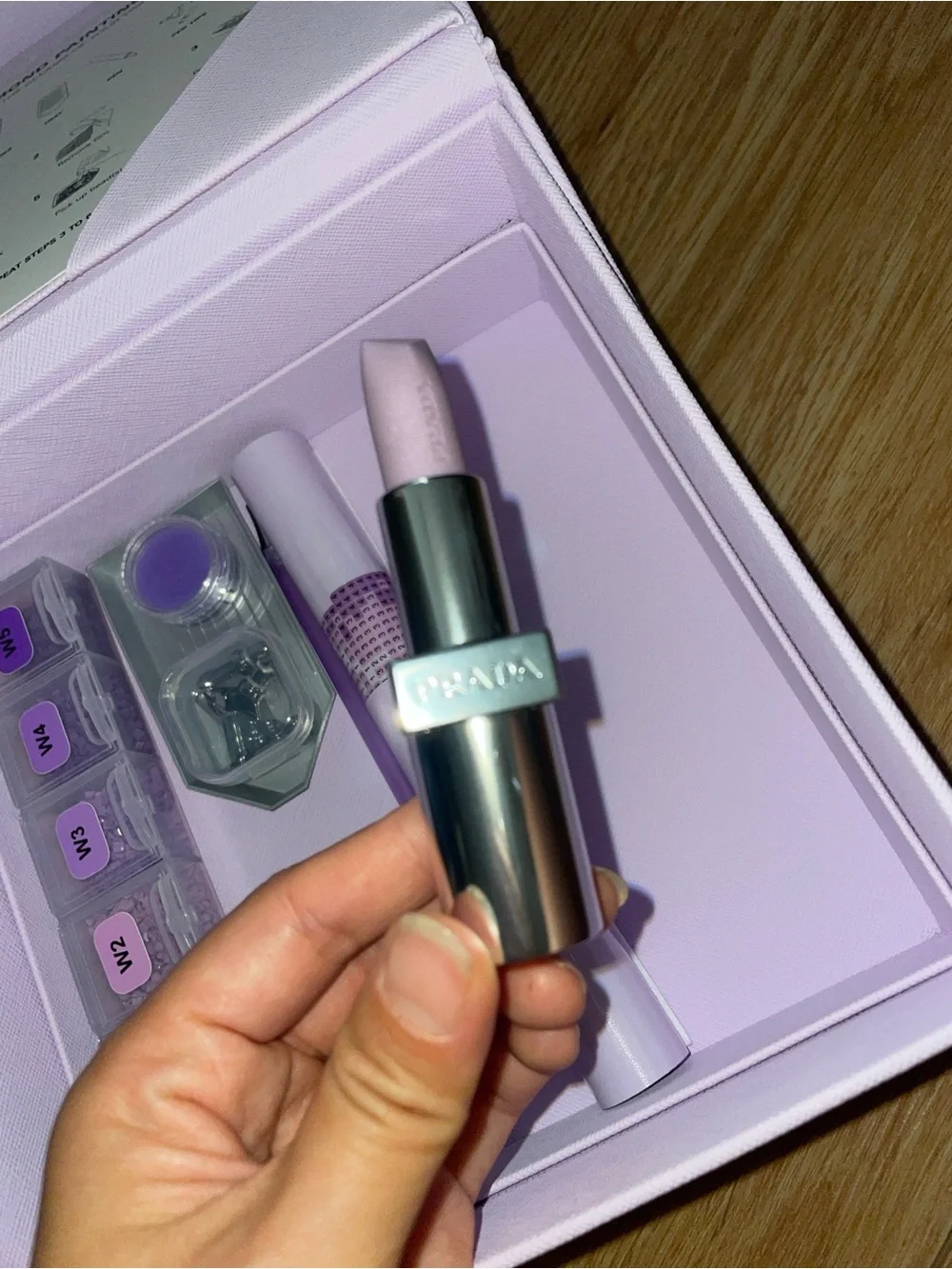 Prada lip stick and gem